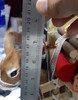 A professional product presentation of the handmade fur donkey figurine from a premier UAE gift and home decor shop.
