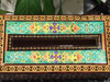 A professional display view of the Khatamkari tissue box highlighting its rectangular form and rich cultural design elements.