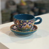 Hand painted tea cup and Saucer