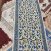 A premium 150x40 cm Ghalamkari table runner from Craftihouse, perfect for adding traditional elegance to any dining table.