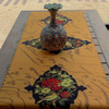 A professional product presentation of the exclusive 130x50 cm printed velvet table runner from a premier UAE gift shop.