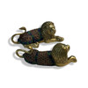 Detailed view of the ornate stone-inlaid blankets on these brass lion statues.