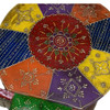 Close-up view of the intricate hand-painted detailing, vibrant pigments, and fine wooden craftsmanship on the decorative elephant stool.