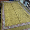 A professional product shot of the 150x100 cm hand block printed textile laid out on a neutral studio background.