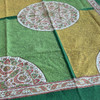 A beautifully styled 150x100 cm block-printed tablecloth, perfect for adding a touch of heritage to your dining room