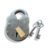 Close-up of the distressed metal texture and the robust shackle on the vintage rectangular padlock.