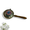 A premium brass bukhoor burner, an essential tool for traditional Arabic incense rituals, showcasing a sophisticated wooden handle.
