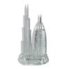 A professional product presentation of the exclusive crystal Dubai monument with LED light from a premier UAE gift shop.