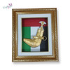 Full setting presentation of the premium framed Middle Eastern heritage golden Khanjar, styled elegantly on an upscale boardroom wall serving as an elite patriotic token or high-end office decoration.