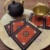 miniature carpet coasters used as a unique table decor accent.