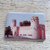 7x5 cm high-quality ceramic magnet with a vibrant print of Al Jahili Fort, ready for display.