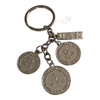 The UAE coin-pattern key ring shown as a stylish accessory on a professional desk, highlighting its executive appeal.