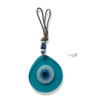 A collection of colorful glass evil eye wall hanging amulets in assorted patterns with jute rope.