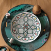 Part of the Craftihouse Collection: An exclusive museum-grade hand-painted Moroccan ceramic charger plate framing a refined bridge between heritage craft and fine dining.