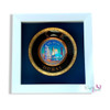 A sophisticated, framed collectible item featuring iconic landmarks of Dubai.