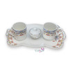 A professional product shot of the ceramic coffee cup set with tray and matching sugar bowl on a textured wooden surface.