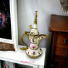 An exclusive Craftihouse unique souvenir gift in the UAE showcasing a luxurious decorative Arabic coffee pot.