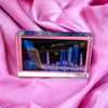 A professional product presentation of the decorative Abu Dhabi souvenir block from a premier UAE gift shop.