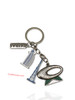 Polished metal keychain celebrating Dubai's world-famous city skyline.