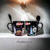 Matching pair of ceramic coffee mugs with "Dubai" text and iconic silhouette illustrations.