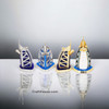 Craftihouse Burj Al Arab architectural models, showing four variations lined up on a white background, highlighting the helipad detailing and bases stamped with "DUBAI".