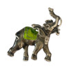 A collectible metal elephant magnet with a striking green enamel detail, perfect for enhancing your kitchen decor.