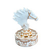 A professional product presentation of the white resin-gypsum oud burner against an elegant interior backdrop.