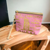 An exclusive product presentation of the pink Dubai souvenir pouch from a premier art, gift, and home decor supplier.