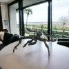 A professional product presentation of the 26 cm metal deer sculpture set displayed against a neutral shelf background.