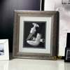 A professional product presentation of the executive Khanjar dagger framed art from a premier UAE shop.