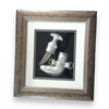 silver dagger in a frame, showcasing the fine craftsmanship suitable for a luxury gift for a boss.