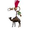 Craftihouse heritage collection, showcasing an embellished camel keychain with a stylish white tassel accent.