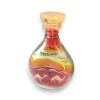 Close-up of the highly detailed sand layering and expansive desert landscape inside a 20 cm Abu Dhabi keepsake bottle.