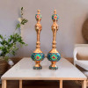 A premium pair of Minakari copper pitchers with lids from Craftihouse, designed to serve as an opulent focal point for sophisticated interiors.
