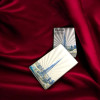 Close-up of the elegant Burj Khalifa-themed card backs and customized face design.