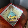 15 cm tall sand art bottle with a custom name in a desert scene, presented in an elegant gift box.