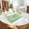 An aesthetic hand-painted ceramic set, featuring a cute girl pattern, ideal for a cozy tea or coffee time.