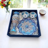 A complete Luxury Minakari Copper Gift Set featuring a hand-painted plate, vase, and two bowls nestled in a premium blue velvet 26x26 cm box.