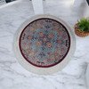 Close-up view of the fine silk texture and intricate patterns on this 45 cm round machine-made decorative mat.