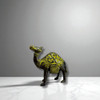 An elegantly crafted 10x10 cm metal camel sculpture, ideal for shelves and desks.