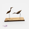 Artisan wooden bird sculpture with solid wooden base for contemporary home interiors