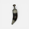 Close-up of the authentic Arab Peninsula craftsmanship on the 34cm dagger's hilt and metalwork.