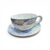 Close-Up Of The Calligraphy "دریغ اگر من و تو" On The Side Of A Handmade Ceramic Coffee Cup.