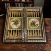 A 30x30 cm luxury handmade wooden game set with a chessboard exterior and a hand-painted Persian hunting scene interior.