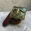 A premium handmade natural leather belt in a rich tan color featuring a stunning 3D silver-color longhorn steer buckle.
