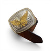 Close-up of the highly detailed 3D golden falcon buckle and the high-quality natural leather grain of the artisanal belt.