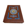 A profile view showing the internal mirror detail and the ornate gold-toned trim of the leather-textured Quran display box.
