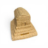 Detailed close-up of the stepped tiers and stone texture detailing on a composite gypsum tomb of Cyrus statue.