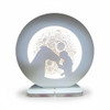 Detailed close-up of the fine sculptural lines defining the horse head and young girl silhouette sharing a gentle bond on the decorative lunar night light.