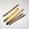 A premium hand-carved Desfuli reed calligraphy pen featuring a precision-cut nib for Arabic script.